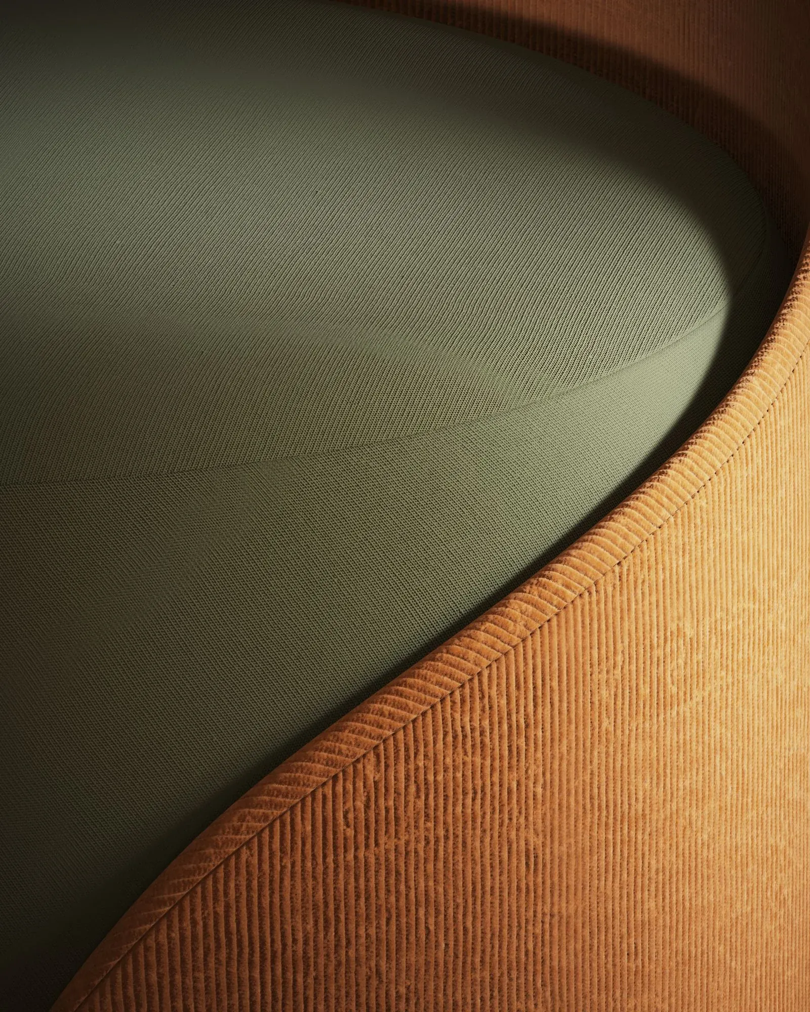 Close view of woven upholstery on a curved chair seat