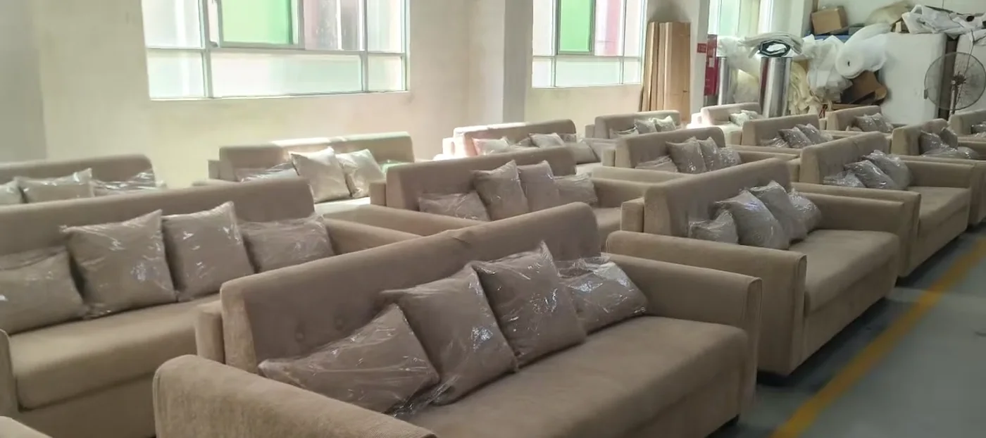 Finished upholstered sofas arranged in the production workshop