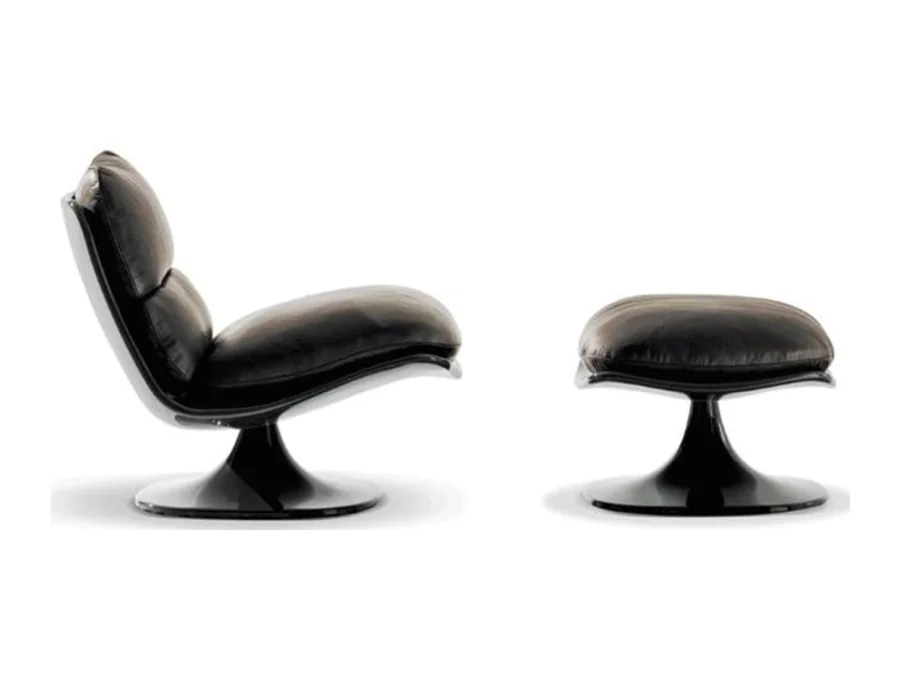 Low black contoured swivel recliner chair with matching pedestal ottoman
