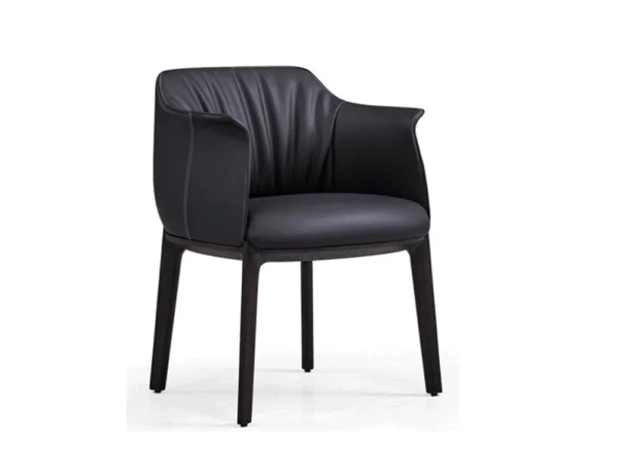 Tailored upholstered dining armchair with slim dark legs for hotel restaurant projects