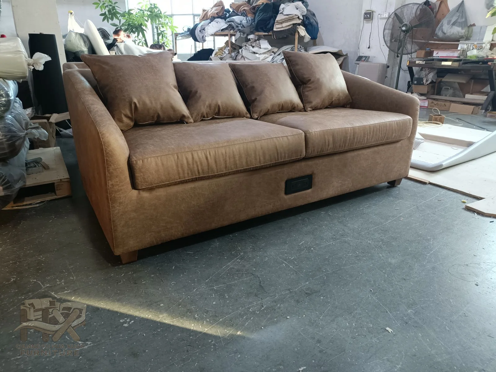 A box-arm sofa opens a mattress platform forward; pale and tan upholstery examples show the same broad conversion layout.