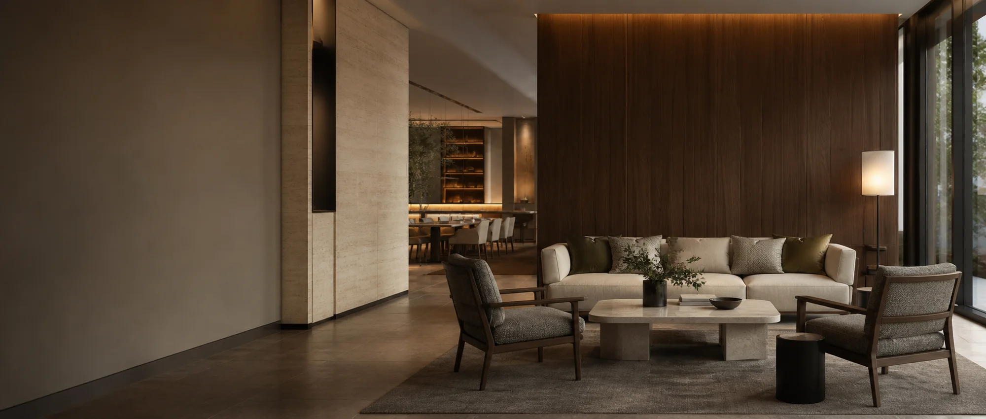 Warm hotel lounge furnished with upholstered seating for commercial projects