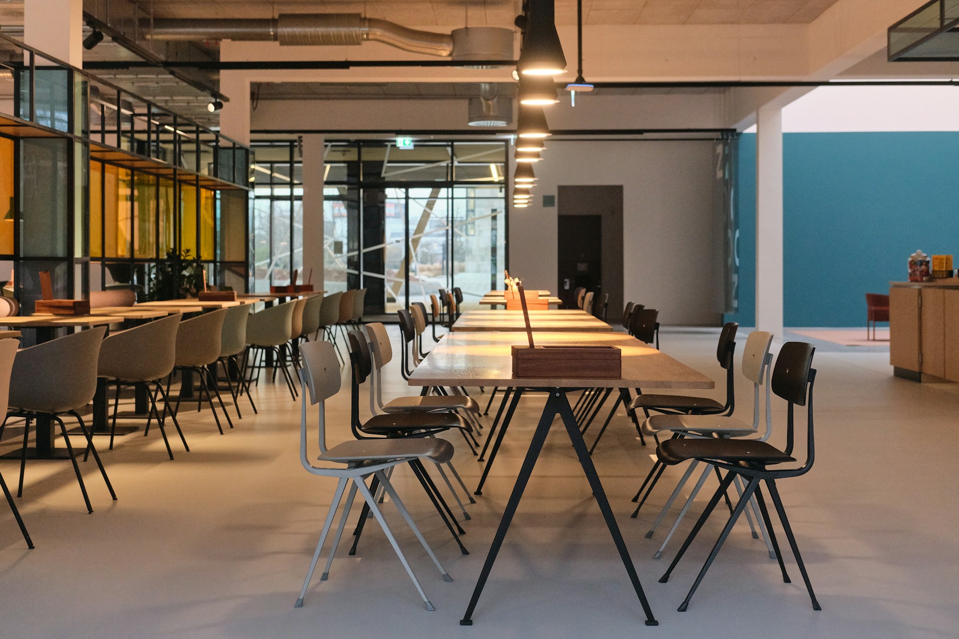Restaurant dining space with commercial tables and chairs