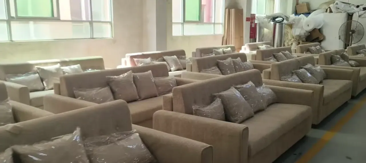 Protected furniture batches staged in a warehouse for export preparation